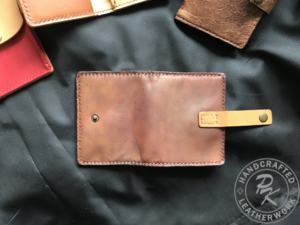 Flora wallet with strap closure in ancient Brown colour