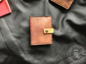 Flora wallet with strap closure in ancient Brown colour