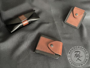 Brett wallet in Black and Brown colour with closure